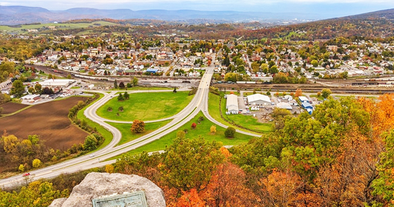 Sunlight Beams Cutting Through Mountain Road, Switzerland